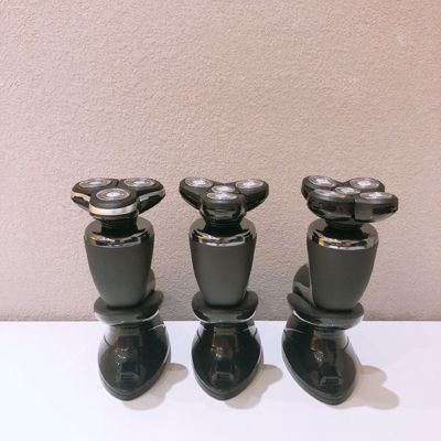 Rasoio elettrico portatile per uomo con lama in acciaio inossidabile e maniglia di plastica per uso facciale